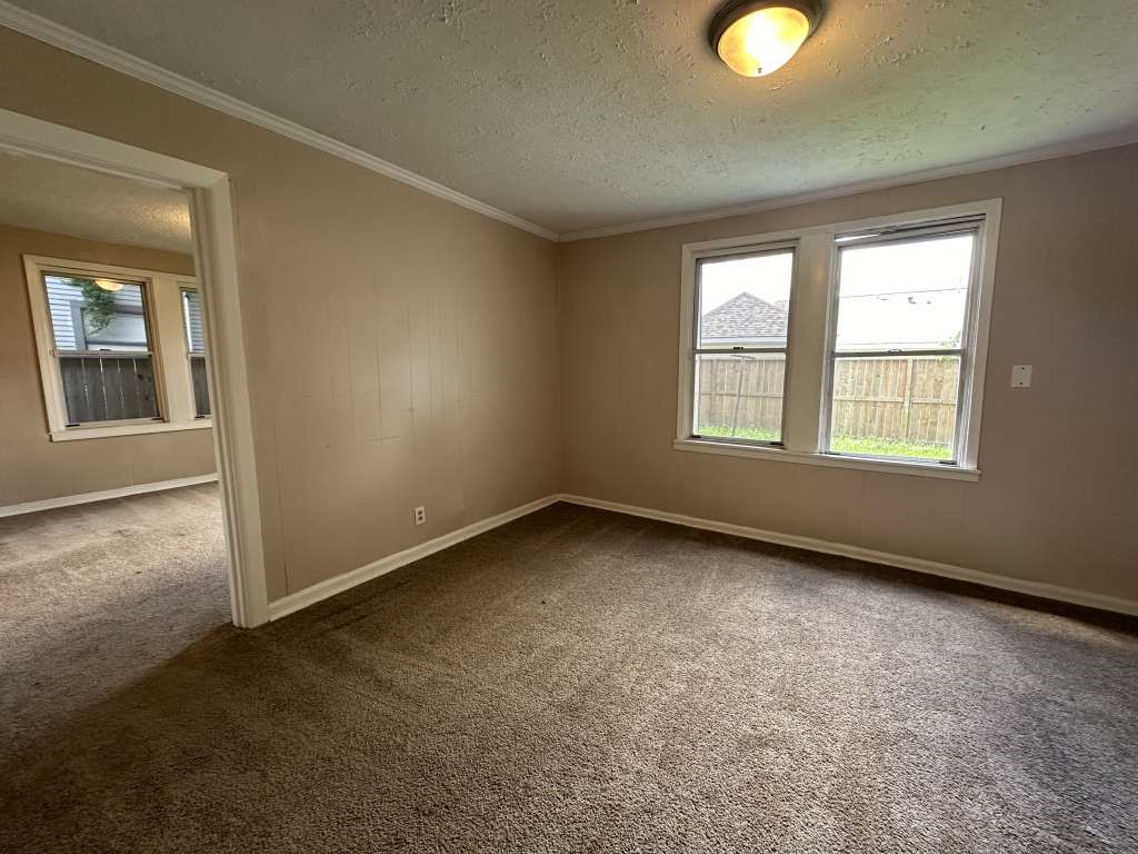 5424 San Juan Street Houston, TX 77020 - Photo 9 of 15 an empty room with a window