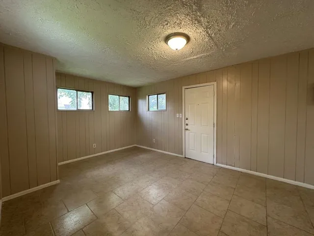 an empty room with windows