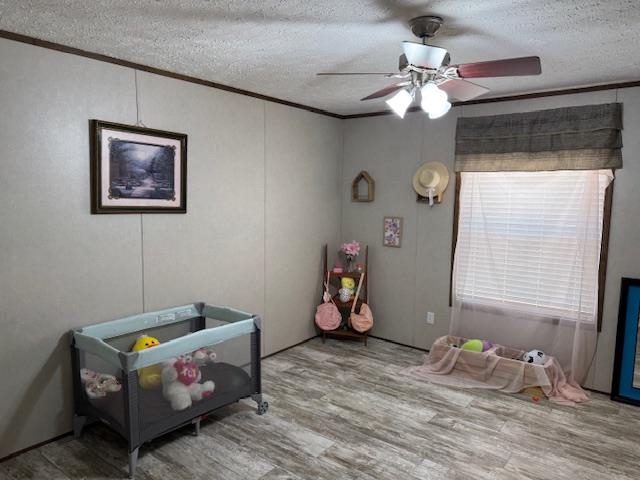 4216 Sandy Flat Road Bethel Springs, TN 38315 - Photo 6 of 15 a bedroom with furniture and a window