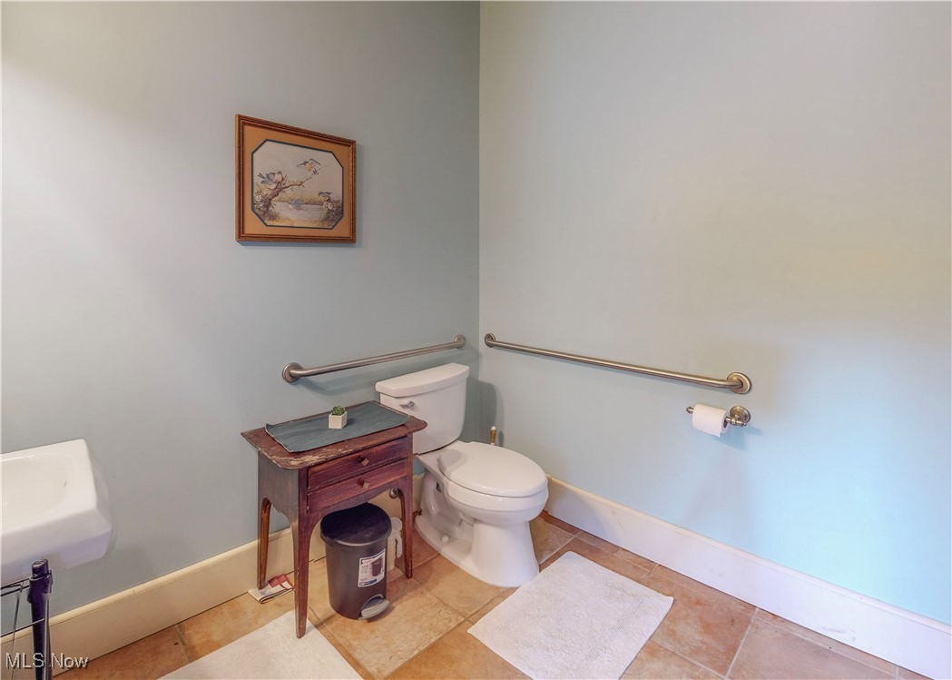 5696 Steubenville Road Southeast Amsterdam, OH 43903 - Photo 24 of 50 Bathroom featuring tile patterned flooring and toilet