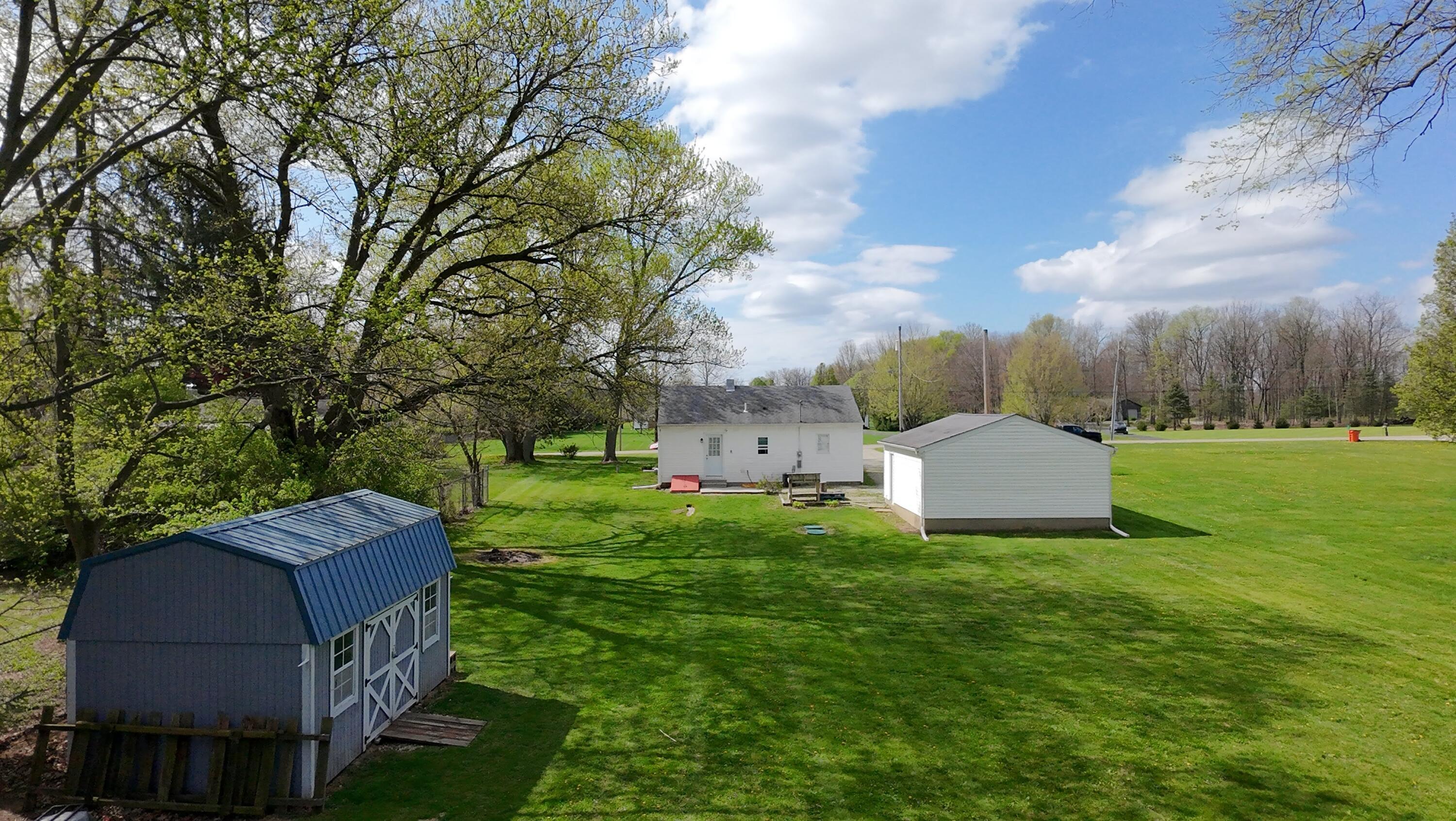 1042 Willow Road Springfield, OH 45502 - Photo 4 of 15 dji_fly_20260413_110528_0151_17761123375