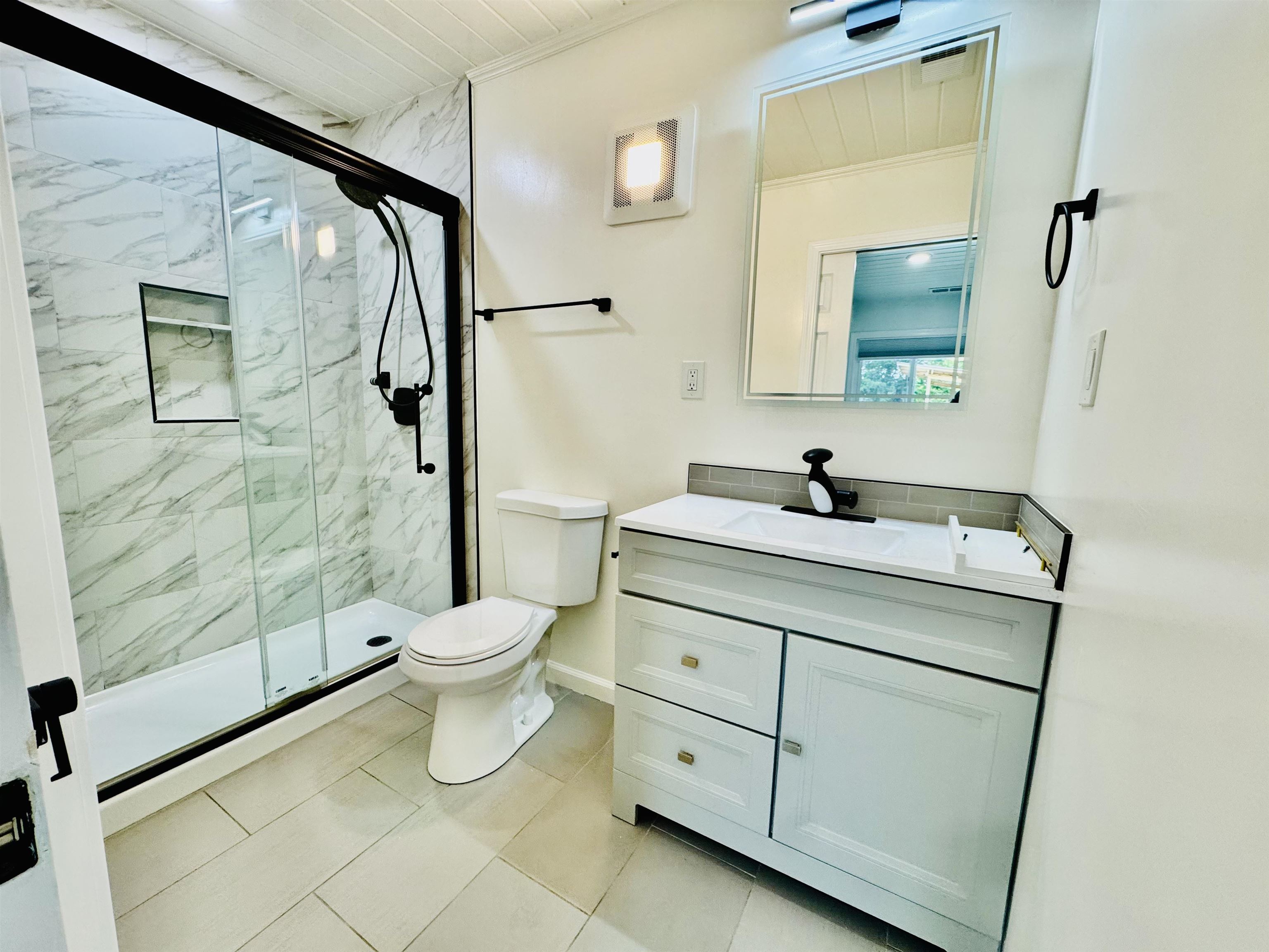 534 Rincon Road El Sobrante, CA 94803 - Photo 8 of 16 Bathroom with a marble finish shower, vanity, light tile patterned floors, and wooden ceiling