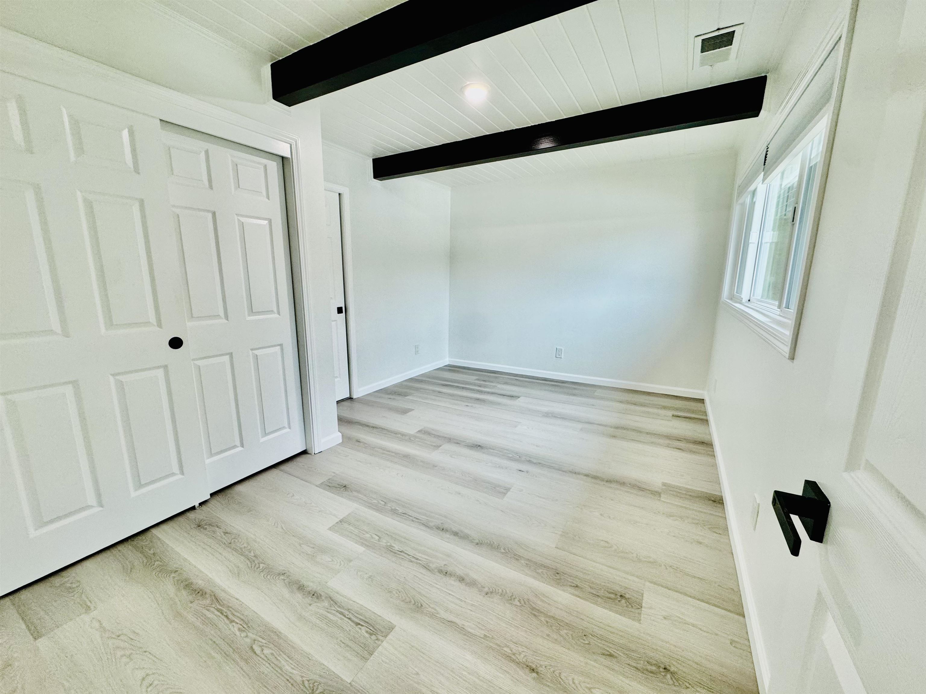 534 Rincon Road El Sobrante, CA 94803 - Photo 9 of 16 Unfurnished bedroom with a closet and light wood-style flooring