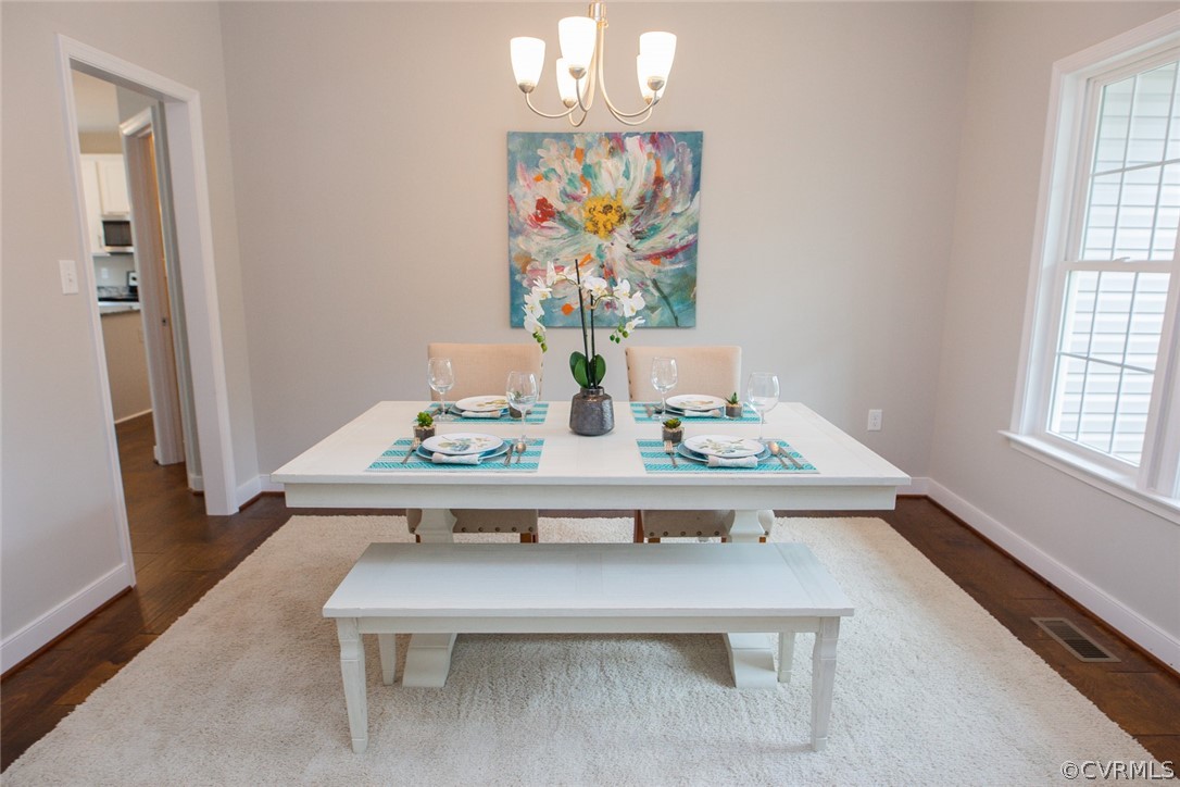 0 Corte Castle Road Chesterfield, VA 23838 - Photo 13 of 37 a view of a dining room with furniture window and wooden floor
