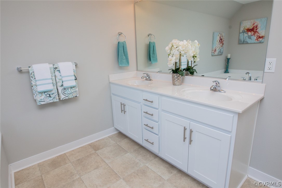 0 Corte Castle Road Chesterfield, VA 23838 - Photo 18 of 37 a bathroom with a double vanity sink and a mirror