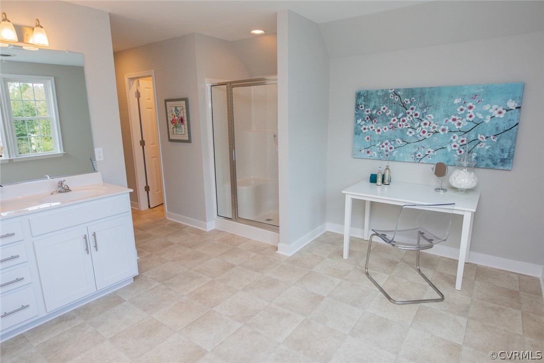 0 Corte Castle Road Chesterfield, VA 23838 - Photo 20 of 37 a spacious bathroom with a double vanity sink and a mirror