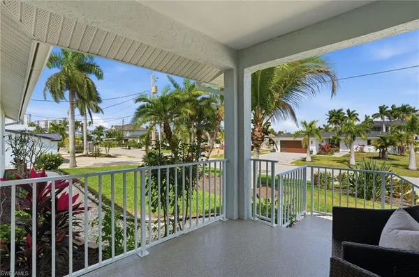 a view of a balcony with lake view