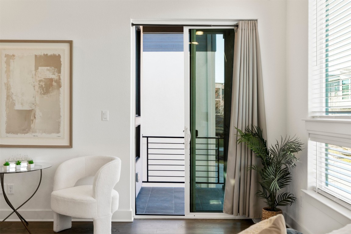 2050 Lohmans Spur Road, Unit 2203 Lakeway, TX 78734 - Photo 17 of 34 Just off the living area, the balcony offers a quiet outdoor escape, perfect for morning coffee or unwinding at the end of the day