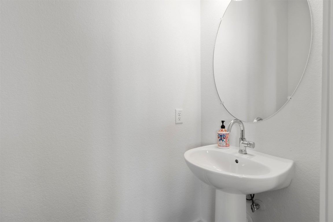 2050 Lohmans Spur Road, Unit 2203 Lakeway, TX 78734 - Photo 27 of 34 Half bathroom on the 2nd floor
