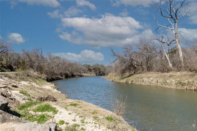 a view of a lake with outdoor space