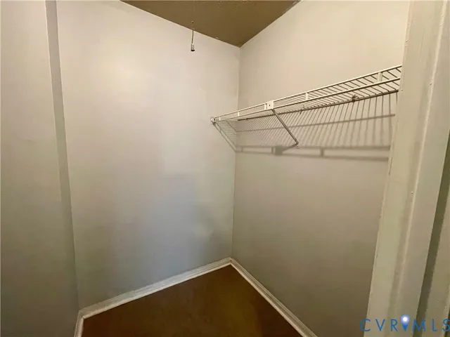 a view of small space with racks on the wall