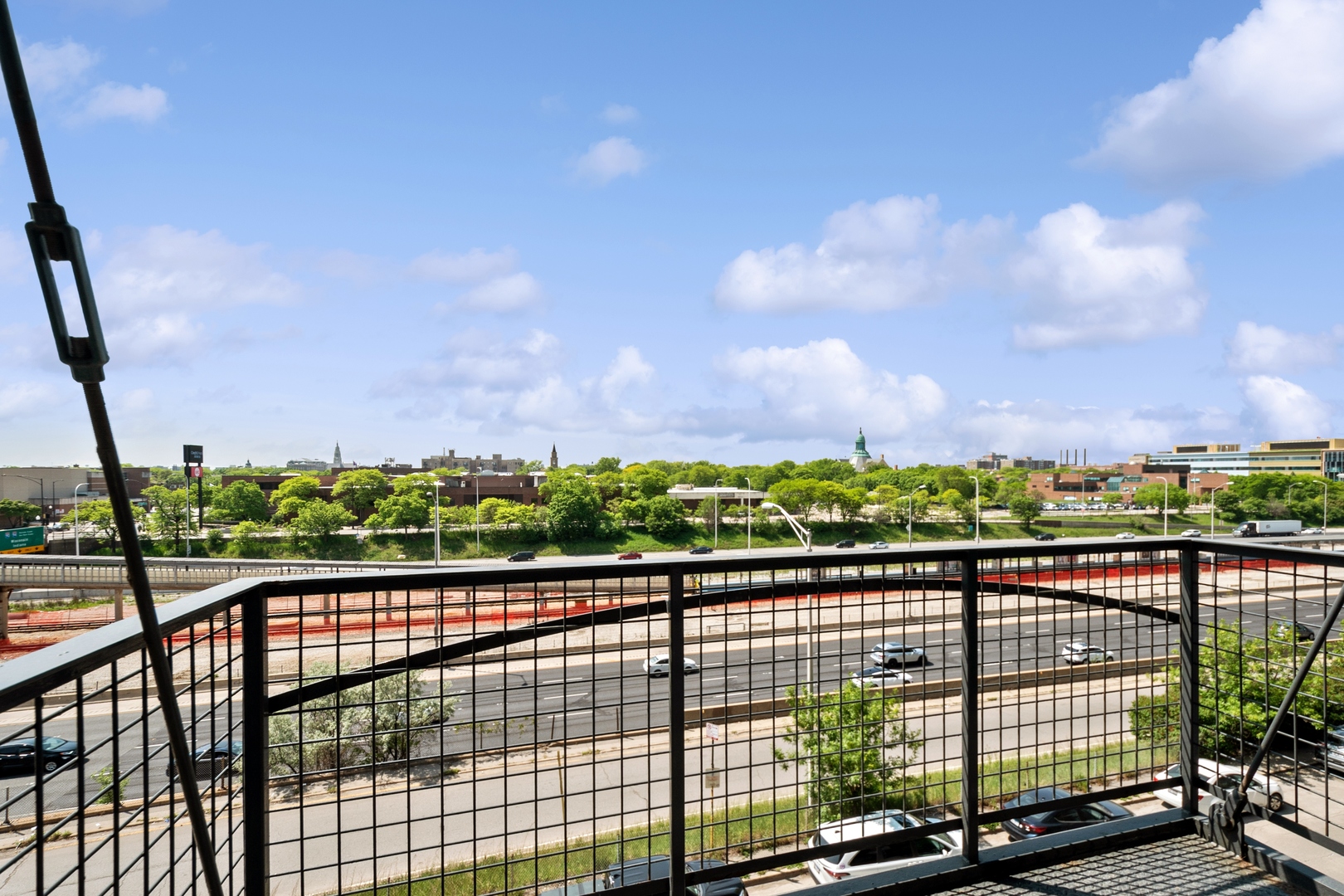 1224 West Van Buren Street, Unit 301 Chicago, IL 60607 - Photo 12 of 14 a view of city from a balcony