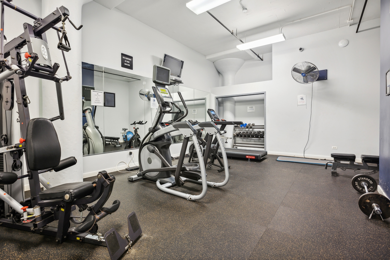 1224 West Van Buren Street, Unit 301 Chicago, IL 60607 - Photo 14 of 14 a view of a room with gym equipment