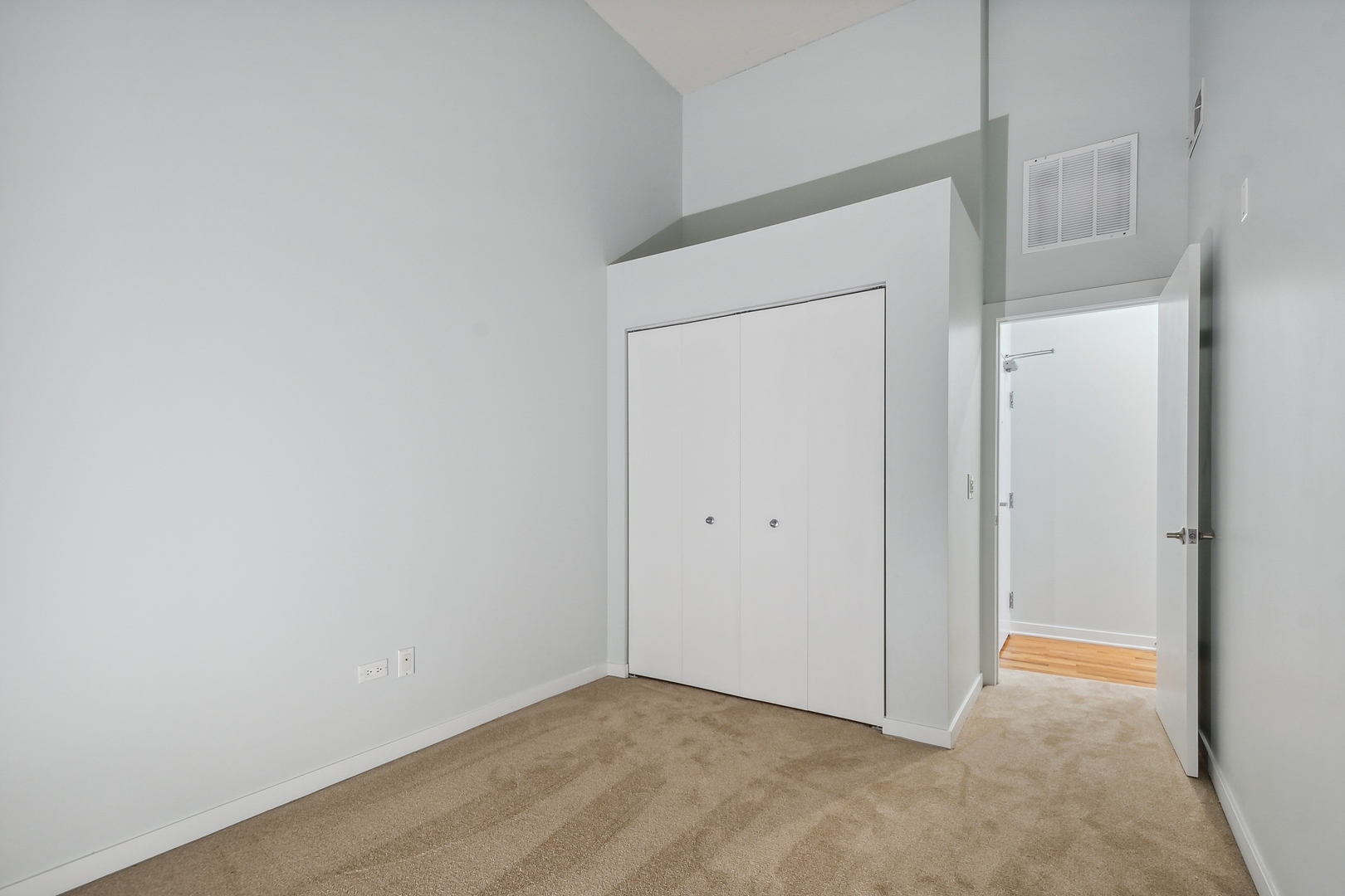 1224 West Van Buren Street, Unit 301 Chicago, IL 60607 - Photo 9 of 14 a view of an empty room
