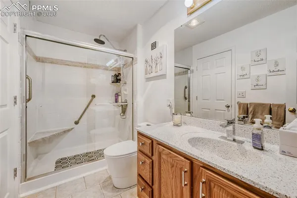 a view of utility room with closet dryer and washer