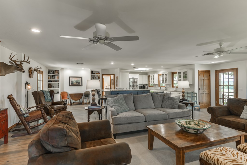 0 County Road Evant, TX 76525 - Photo 37 of 41 a living room with furniture a ceiling fan and a window