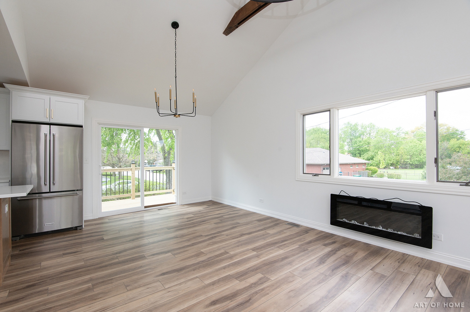 1170 McCarthy Road Lemont, IL 60439 - Photo 23 of 53 a view of empty room with a fireplace and wooden floor