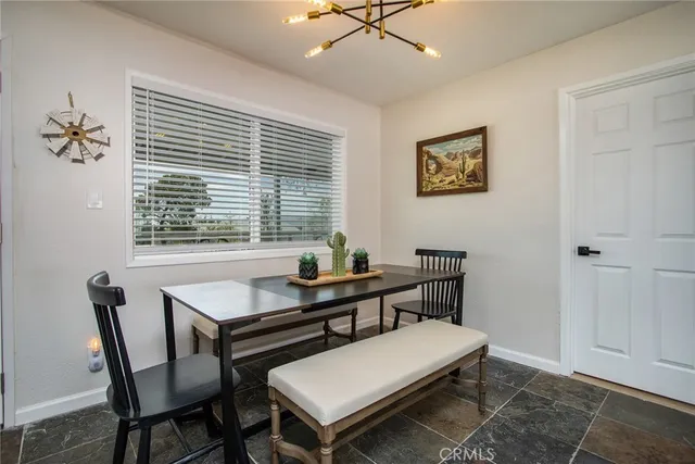 a view of a workspace with furniture