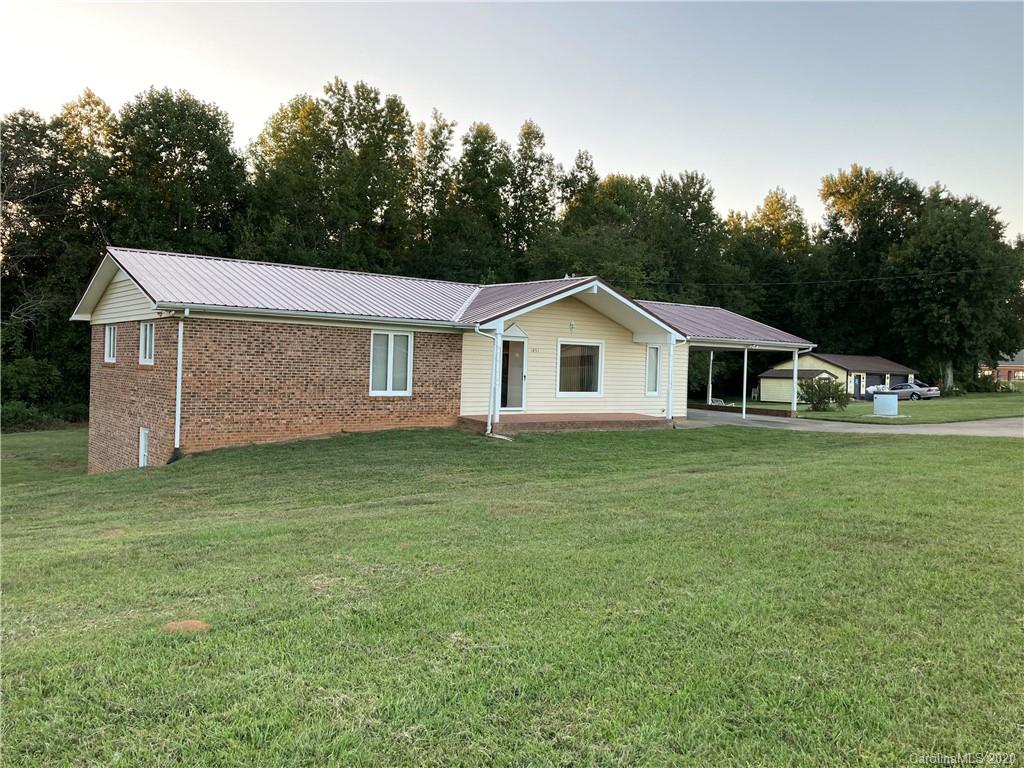 1851 Stoney Point Road Shelby, NC 28150 - Photo 1 of 26 a aerial view of a house next to a big yard with large trees
