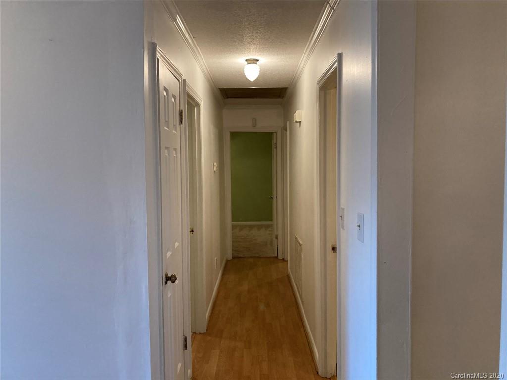 1851 Stoney Point Road Shelby, NC 28150 - Photo 11 of 26 a view of a hallway with wooden floor