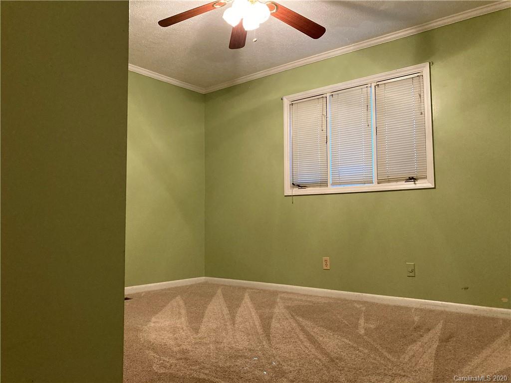 1851 Stoney Point Road Shelby, NC 28150 - Photo 16 of 26 a view of an empty room with a window