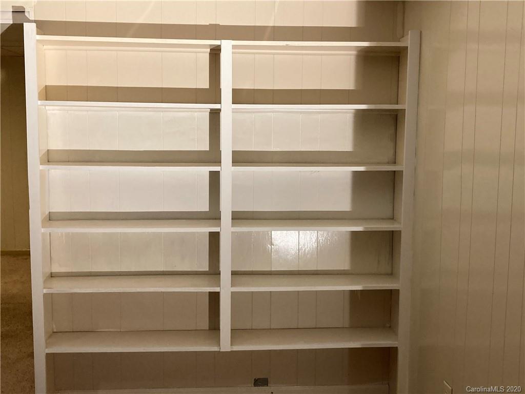 1851 Stoney Point Road Shelby, NC 28150 - Photo 22 of 26 a view of walk in closet with empty racks