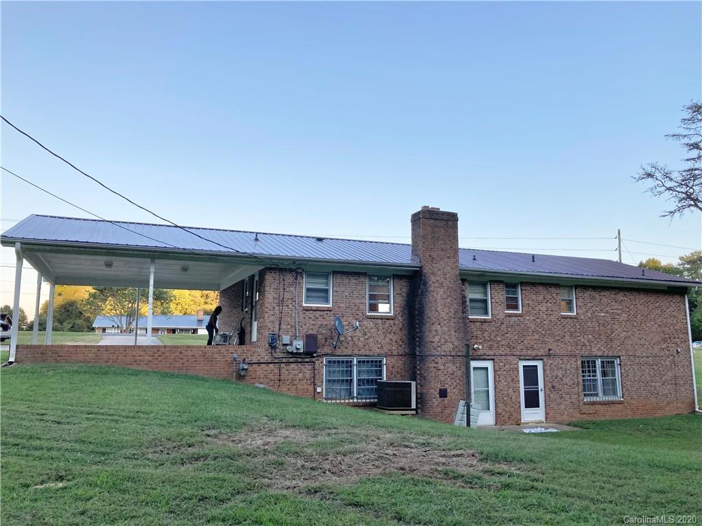 1851 Stoney Point Road Shelby, NC 28150 - Photo 25 of 26 a front view of house with a garden and patio