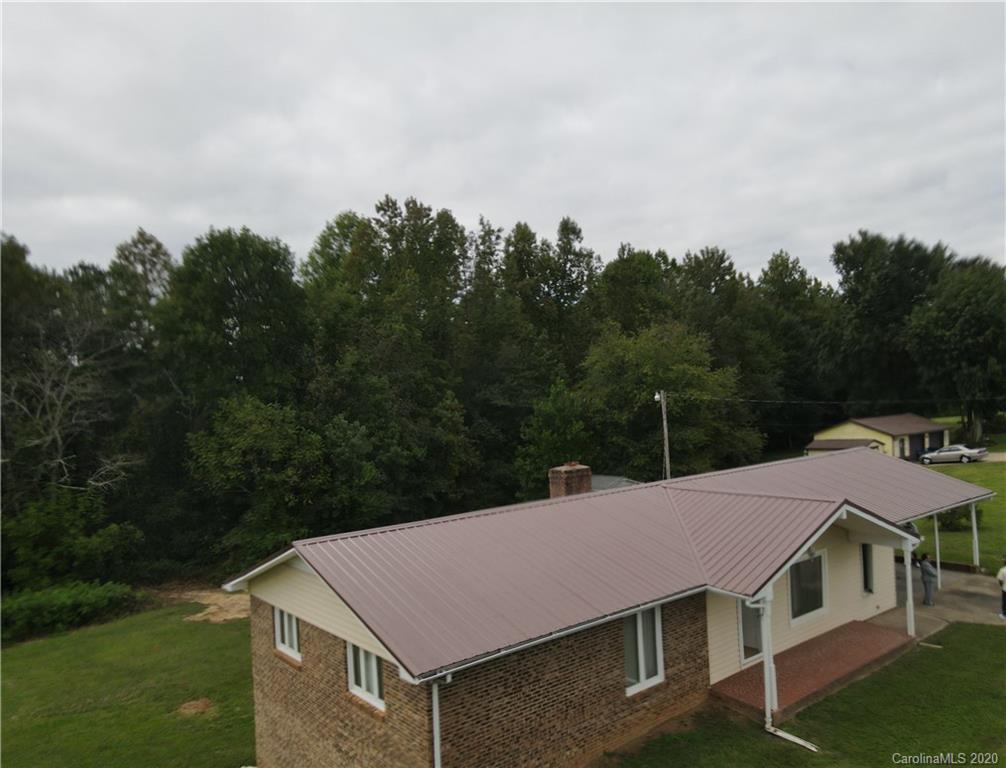 1851 Stoney Point Road Shelby, NC 28150 - Photo 26 of 26 a view of a house with a yard and sitting space