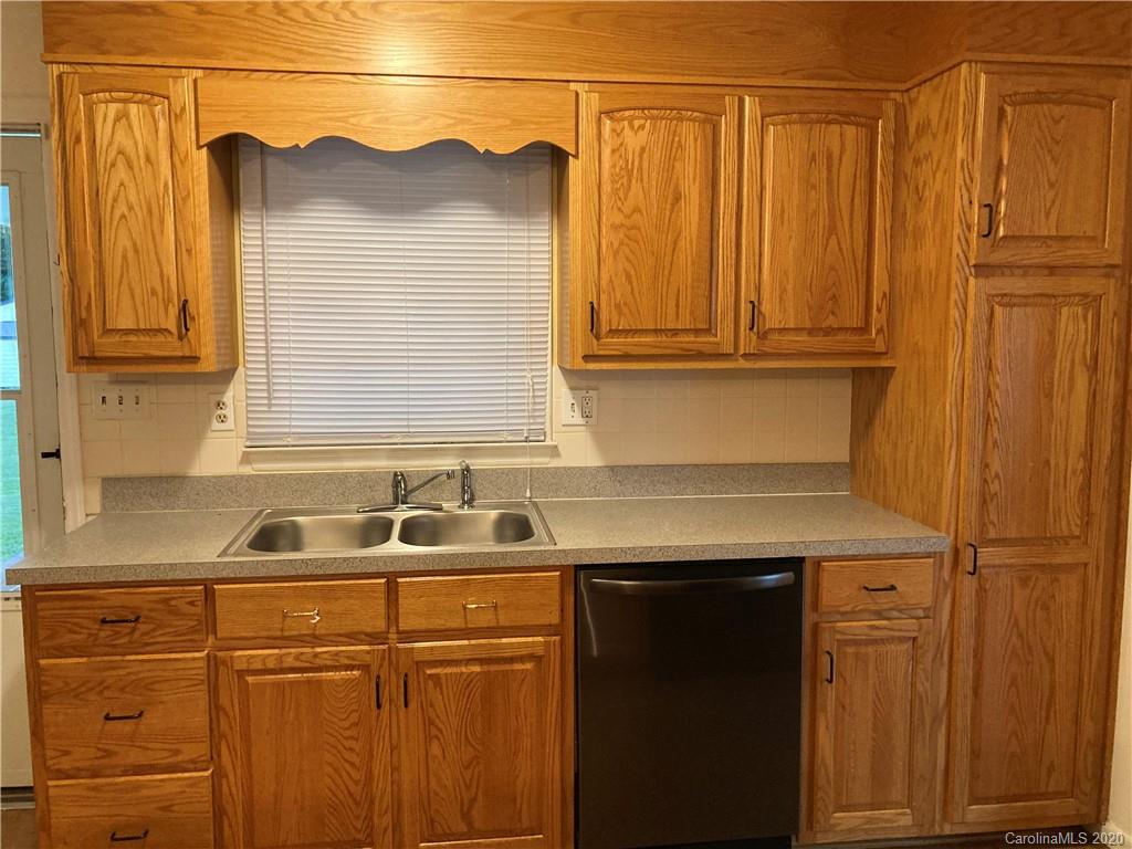 1851 Stoney Point Road Shelby, NC 28150 - Photo 6 of 26 a kitchen with a sink and cabinets