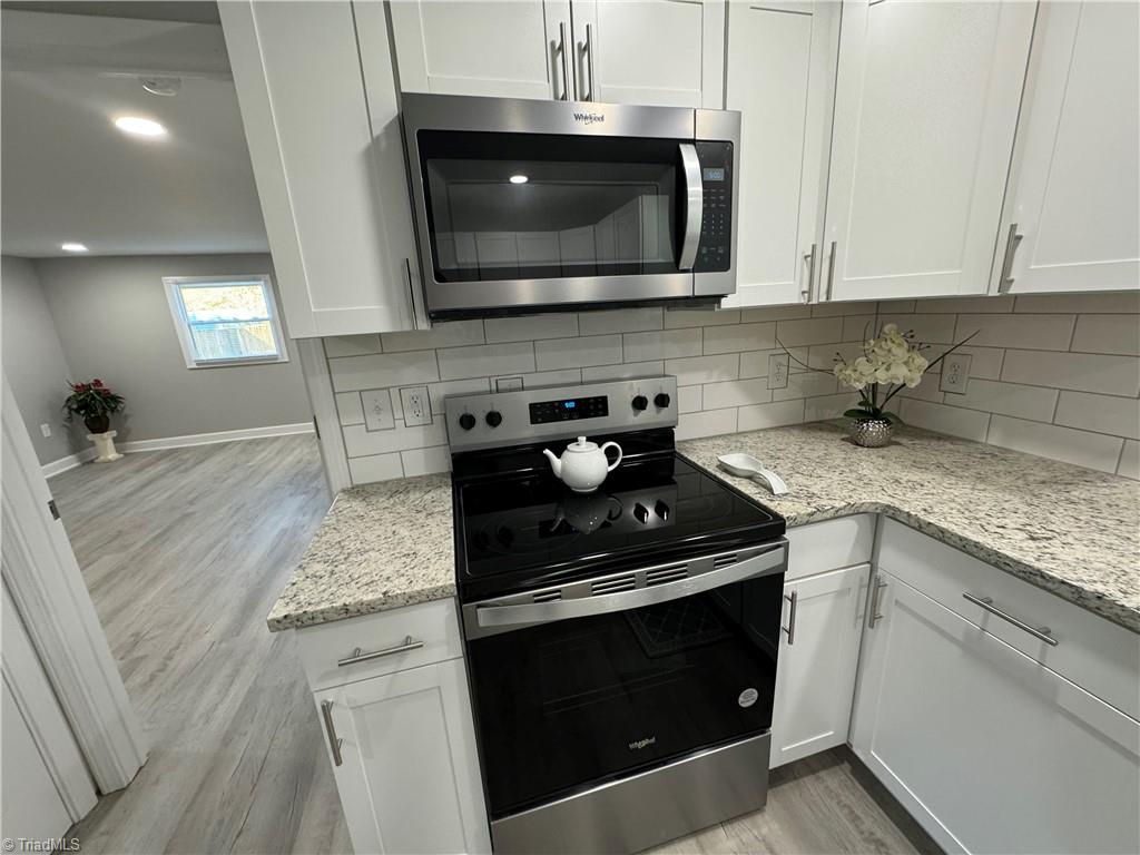 5515 Bethania Road Pfafftown, NC 27040 - Photo 16 of 49 New microwave and glass top stove