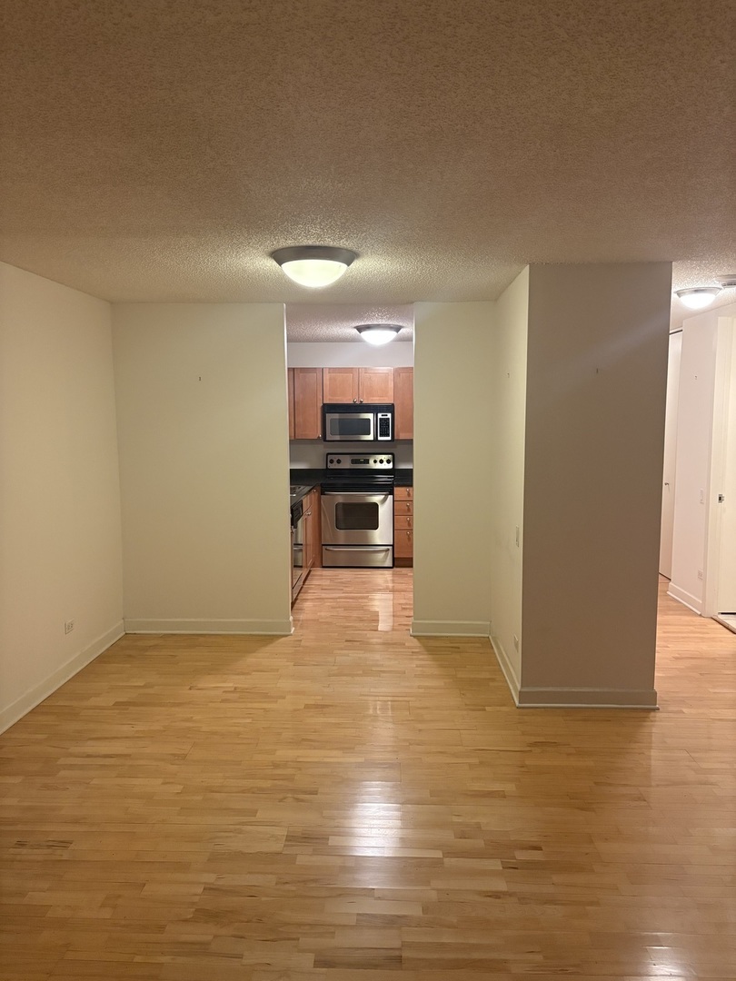 30 East Huron Street, Unit 3601 Chicago, IL 60611 - Photo 11 of 15 a view of a livingroom with furniture