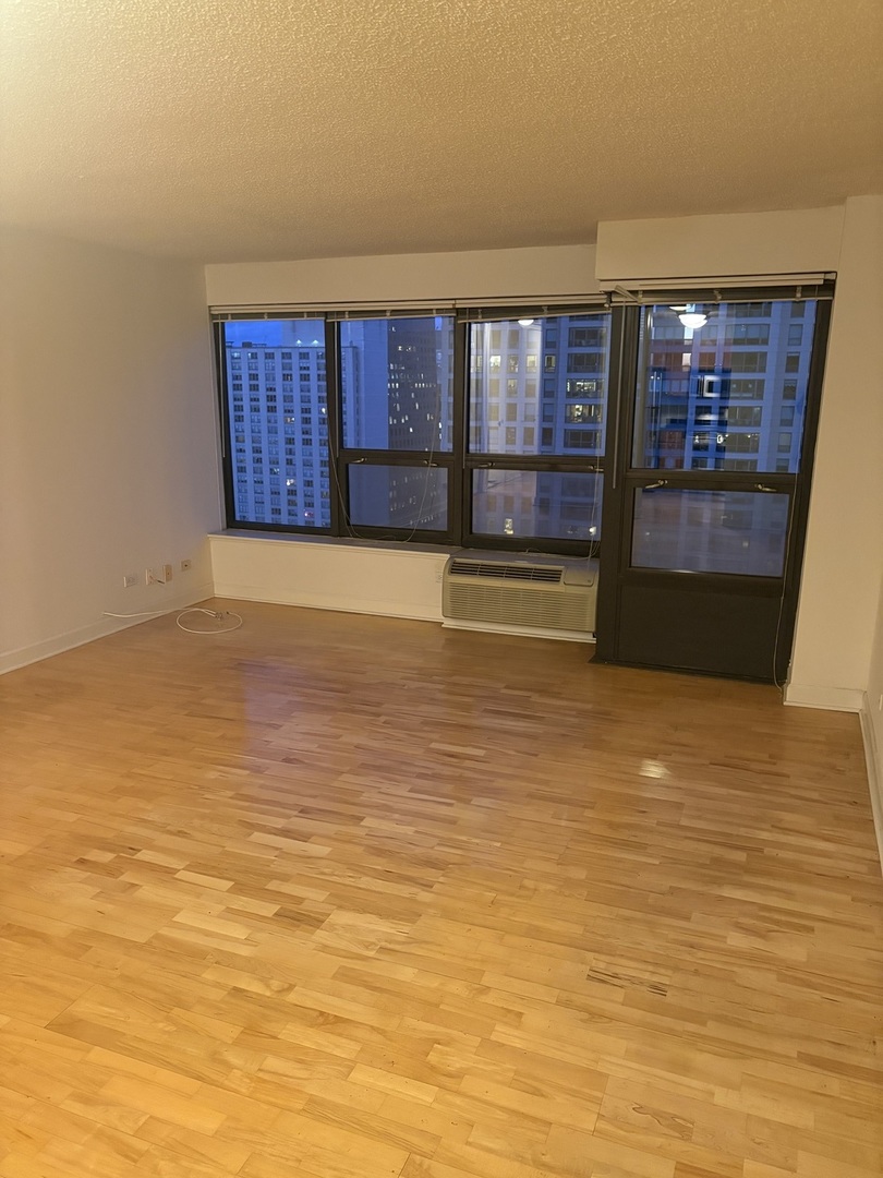 30 East Huron Street, Unit 3601 Chicago, IL 60611 - Photo 7 of 15 a view of a room with an empty room