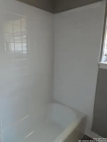 a close up of a bathtub in a bathroom