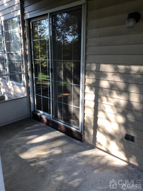 126 Concordia Circle, Unit G Monroe Township, NJ 08831 - Photo 13 of 14 a view of a garden from a room