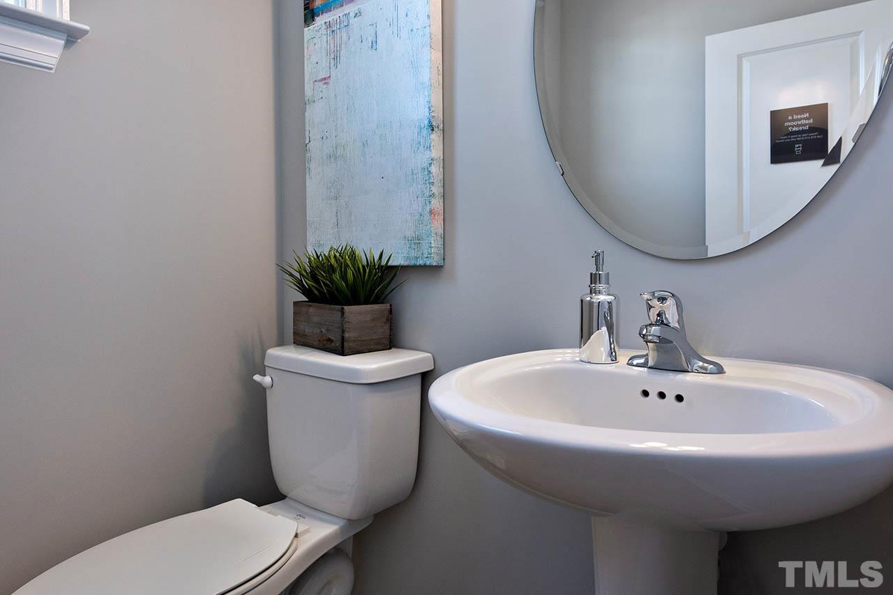 6932 Leesville Road, Unit 7 Raleigh, NC 27613 - Photo 36 of 44 a bathroom with a toilet and a sink