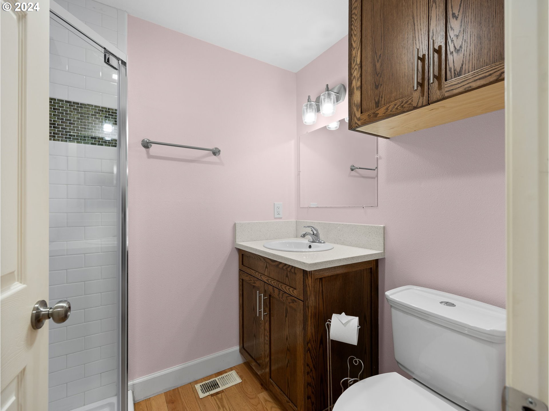 38631 Southeast Hudson Road Boring, OR 97009 - Photo 11 of 39 a bathroom with a toilet sink and mirror
