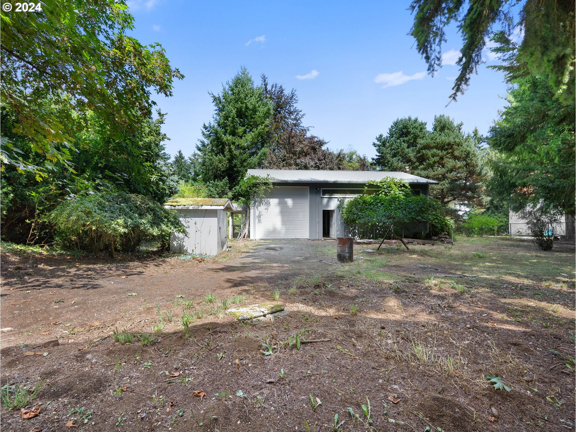 38631 Southeast Hudson Road Boring, OR 97009 - Photo 27 of 39 a view of a house with a tree in the background