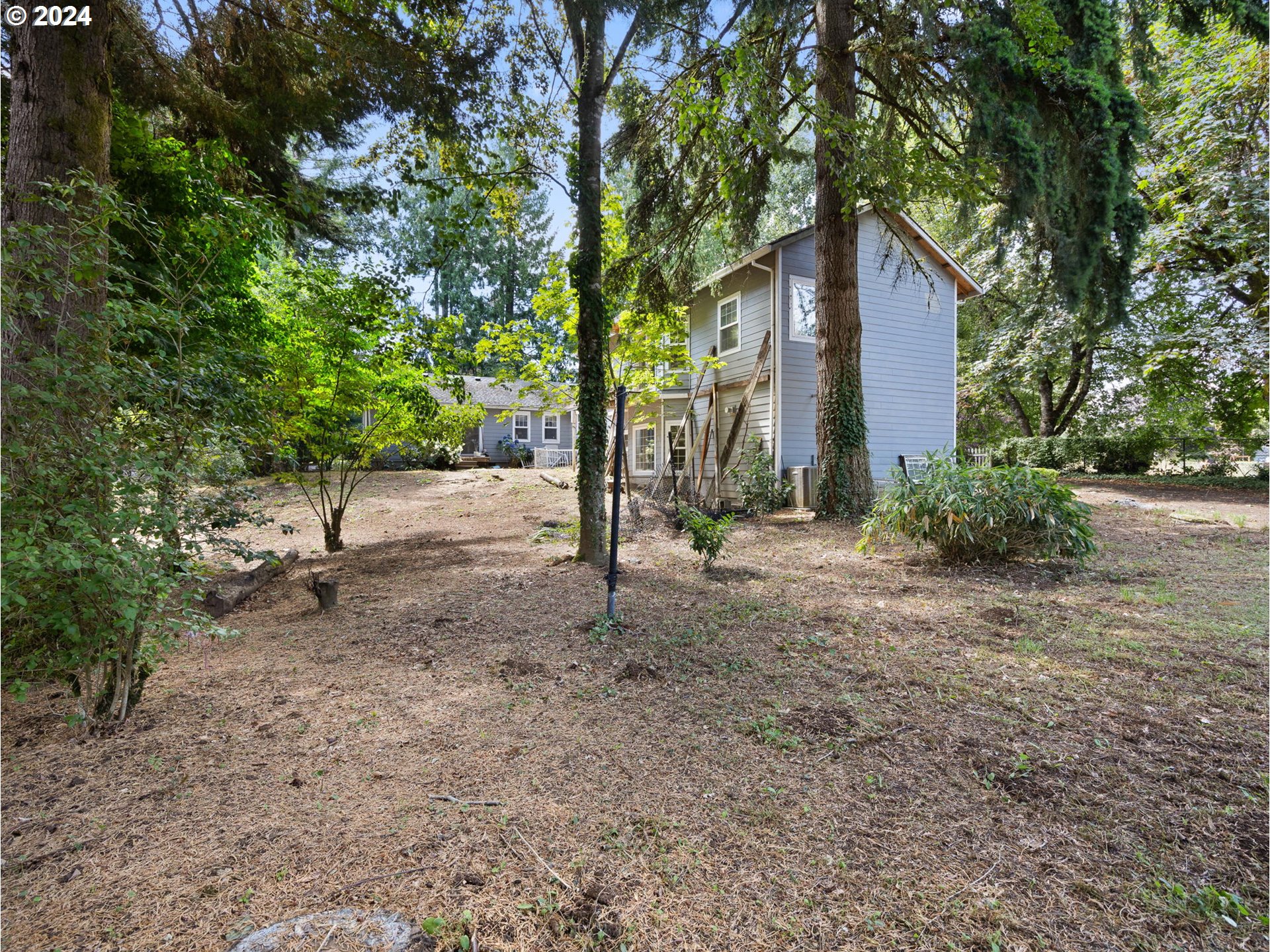 38631 Southeast Hudson Road Boring, OR 97009 - Photo 32 of 39 a view of a house with a yard and tree s
