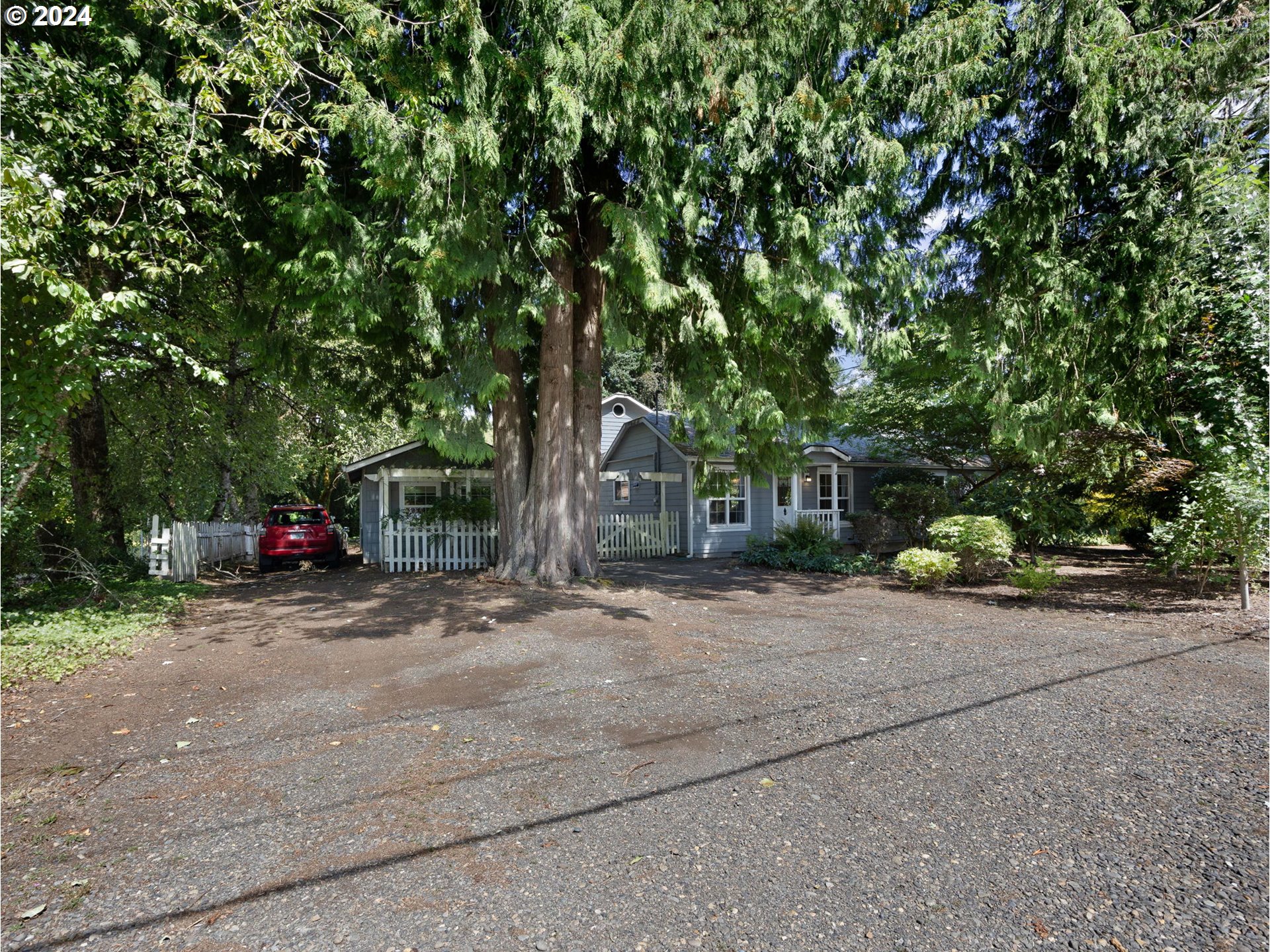 38631 Southeast Hudson Road Boring, OR 97009 - Photo 33 of 39 a view of a house with a tree and plant