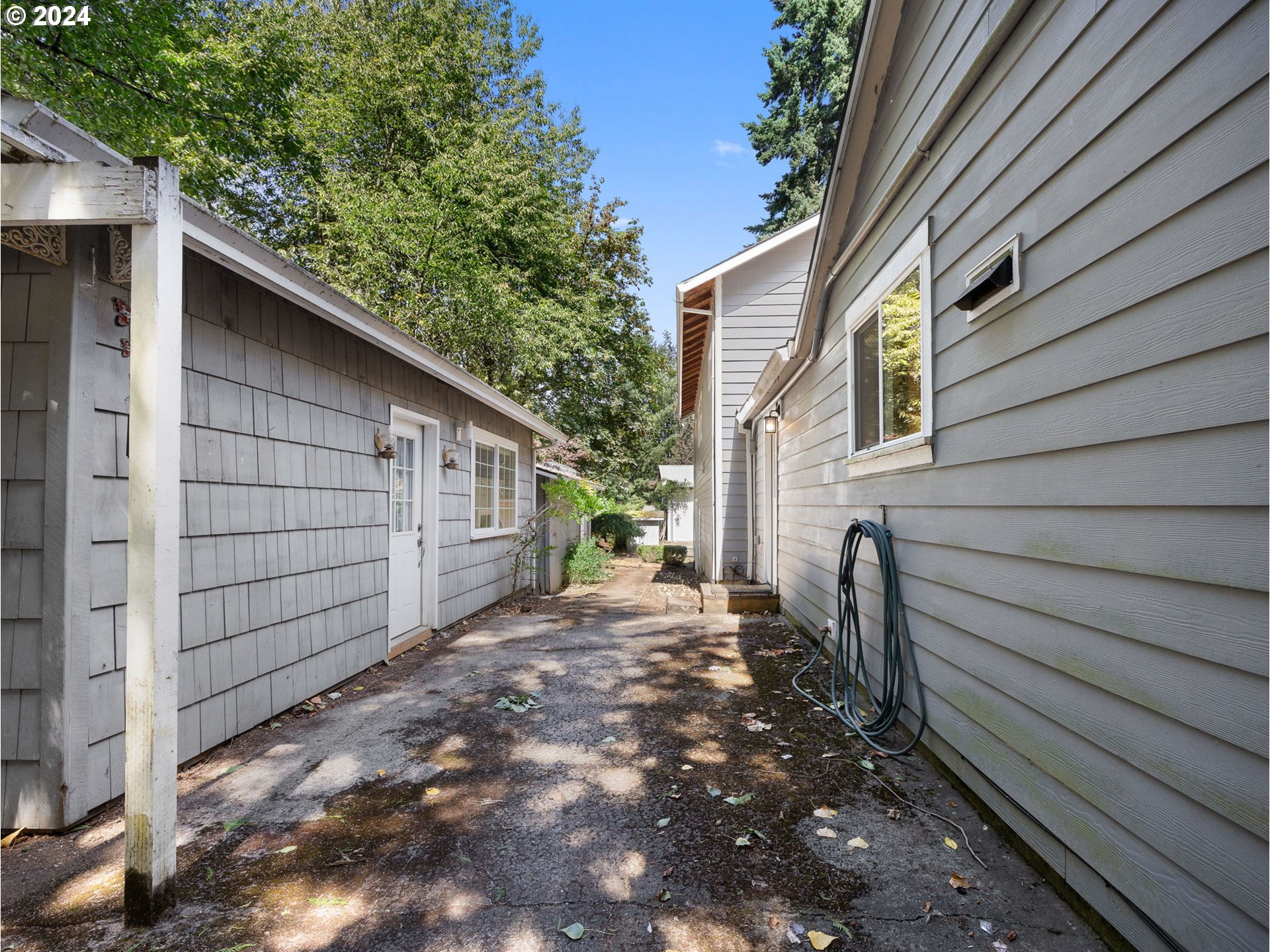 38631 Southeast Hudson Road Boring, OR 97009 - Photo 34 of 39 a back view of a house with a backyard