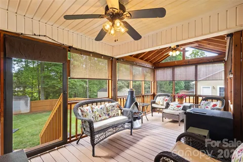 a living room with large windows