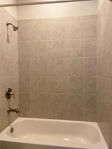a bathroom with a bathtub