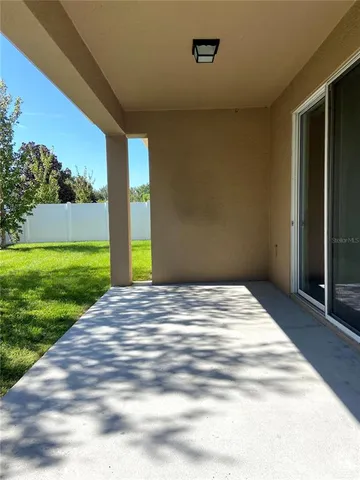 a view of a backyard of a house