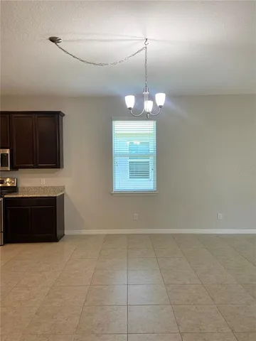 a view of a kitchen with a sink and dishwasher