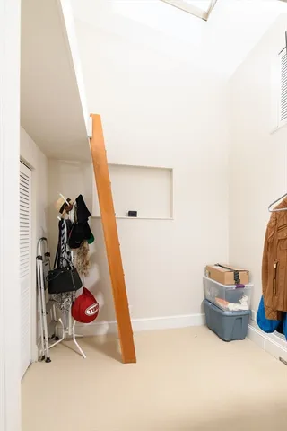 a room with a bed and gym equipment