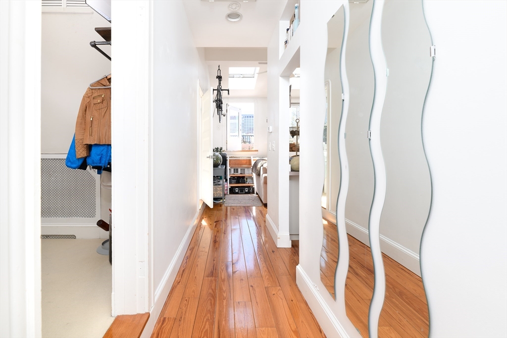261 Marlborough Street, Unit 11 Boston, MA 02116 - Photo 15 of 17 a view of hallway with wooden floor
