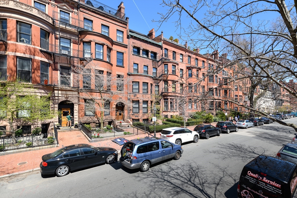 261 Marlborough Street, Unit 11 Boston, MA 02116 - Photo 17 of 17 a car parked in front of a building