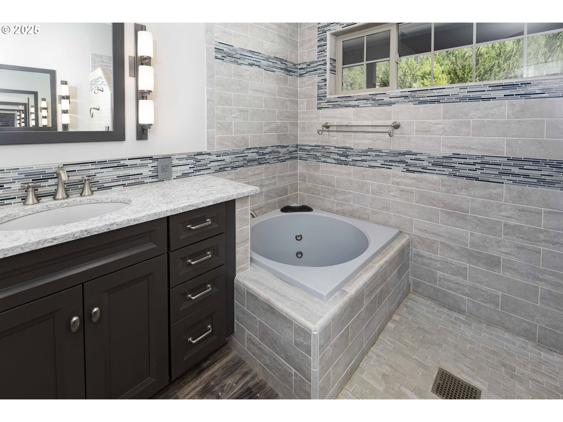 3465 Galls Creek Road Gold Hill, OR 97525 - Photo 15 of 30 a bathroom with a sink and a mirror