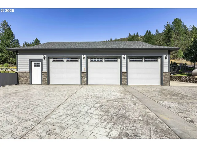 a kitchen with a sink and a refrigerator