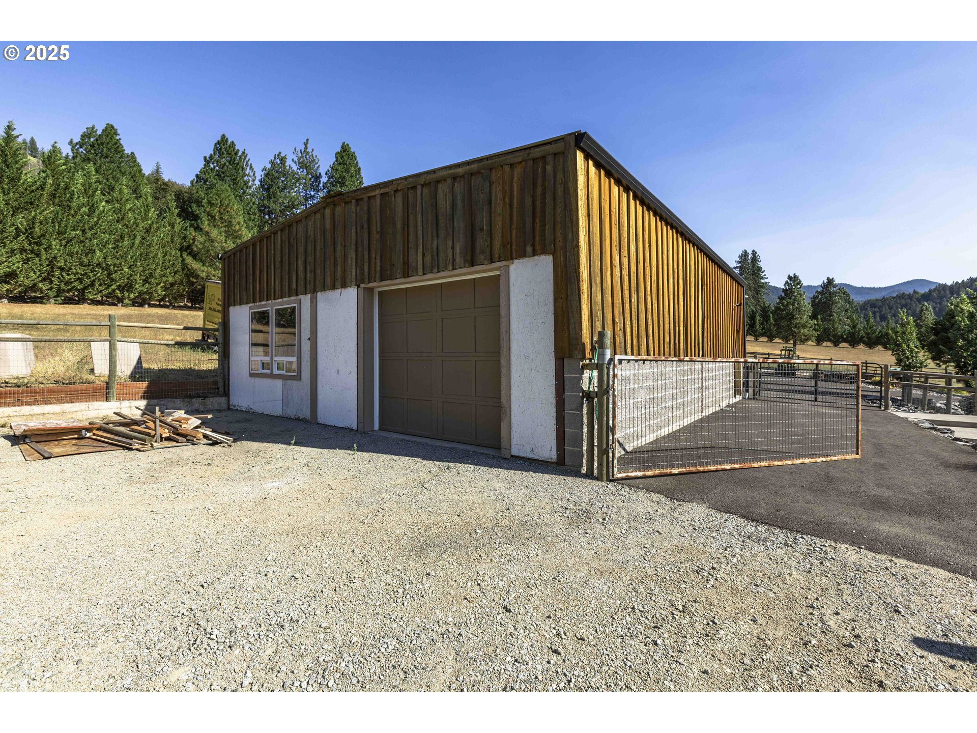 3465 Galls Creek Road Gold Hill, OR 97525 - Photo 27 of 30 a view of a house with backyard
